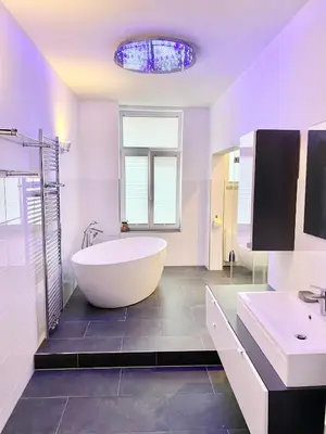 Ein Badezimmer in der Unterkunft Ferienwohnungen Rosentor Goslar Zentrum 180qm & 300qm