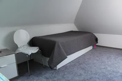 Ein Bett oder Betten in einem Zimmer der Unterkunft Ferienresidenz Jägerstieg / FeWo Kruse