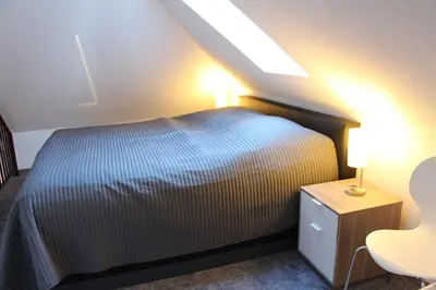 Ein Bett oder Betten in einem Zimmer der Unterkunft Ferienresidenz Jägerstieg / FeWo Kruse