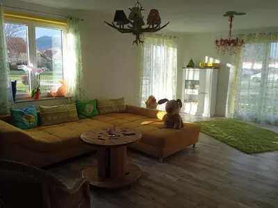 Ein Sitzbereich in der Unterkunft Gartenlaube