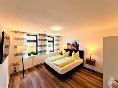 Ein Bett oder Betten in einem Zimmer der Unterkunft Ferienhaus Heider