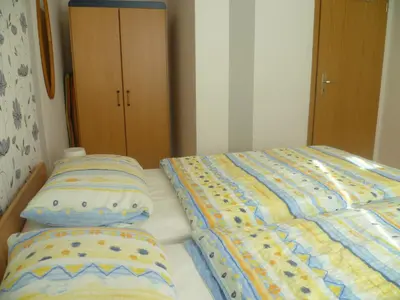 Ein Bett oder Betten in einem Zimmer der Unterkunft Ferienhaus 1