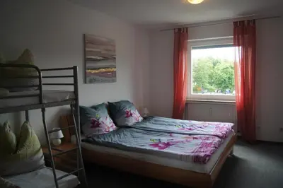 Ein Bett oder Betten in einem Zimmer der Unterkunft Ferienwohnung Downhill am Bocksberg