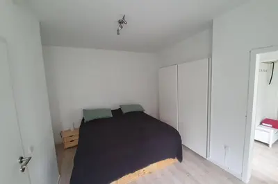 Ein Bett oder Betten in einem Zimmer der Unterkunft Ehem. Berg Apotheke