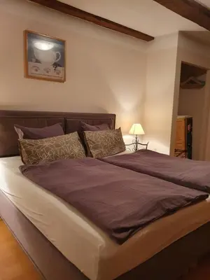 Ein Bett oder Betten in einem Zimmer der Unterkunft Café Burgstraße