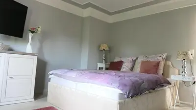Ein Bett oder Betten in einem Zimmer der Unterkunft Über den Dächern