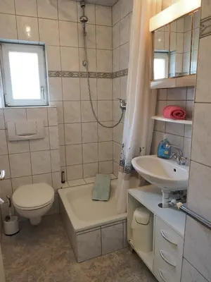 Ein Badezimmer in der Unterkunft Apartments Carmen