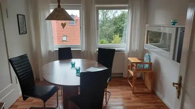 Ein Sitzbereich in der Unterkunft Apartments Carmen