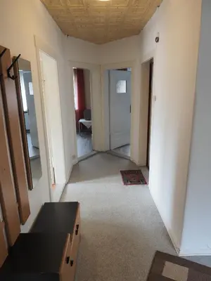 Ein Bett oder Betten in einem Zimmer der Unterkunft Apartments Carmen