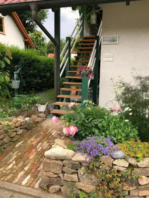 Ein Garten an der Unterkunft Ferienwohnung An der Försterei