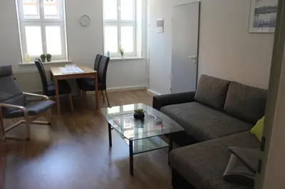 Ein Sitzbereich in der Unterkunft Ferienwohnung Altstadtdomizil