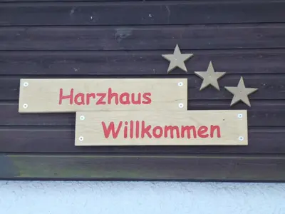 Ein Zertifikat, Auszeichnung, Logo oder anderes Dokument, das in der Unterkunft Harzhaus Willkommen ausgestellt ist