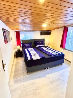 Ein Bett oder Betten in einem Zimmer der Unterkunft Ferienhaus Zur Abzuchtinsel
