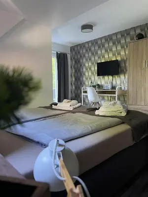 Ein Bett oder Betten in einem Zimmer der Unterkunft Pension Villa Pangea