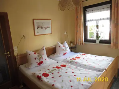 Ein Bett oder Betten in einem Zimmer der Unterkunft Abendröte