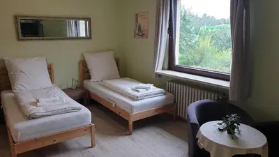 Ein Bett oder Betten in einem Zimmer der Unterkunft Hotel PB