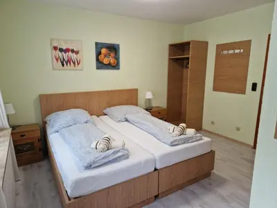 Ein Bett oder Betten in einem Zimmer der Unterkunft Hotel PB