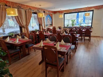 Ein Restaurant oder anderes Speiselokal in der Unterkunft Hotel PB