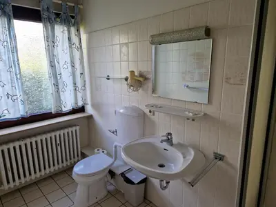Ein Badezimmer in der Unterkunft Hotel PB