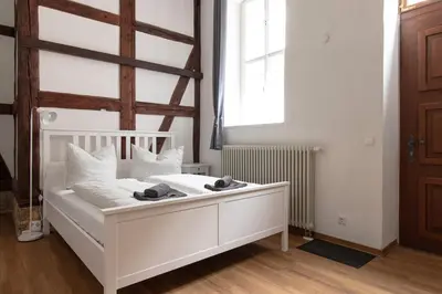 Ein Bett oder Betten in einem Zimmer der Unterkunft Ferienwohnung Mars