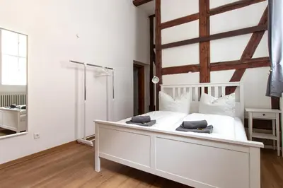 Ein Bett oder Betten in einem Zimmer der Unterkunft Ferienwohnung Mars