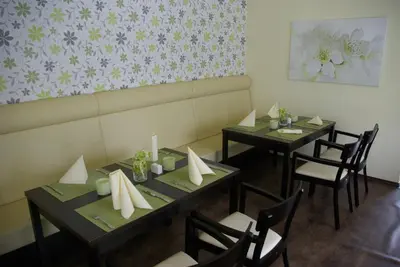 Ein Restaurant oder anderes Speiselokal in der Unterkunft Memory Hotel