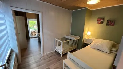 Ein Bett oder Betten in einem Zimmer der Unterkunft Ferienwohnung Wetzig W1 - Breite Straße 104 Wernigerode