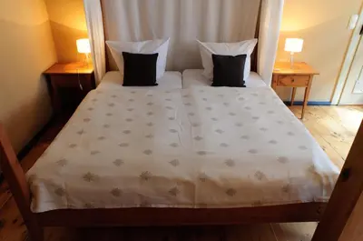 Ein Bett oder Betten in einem Zimmer der Unterkunft Hotel am Hoken
