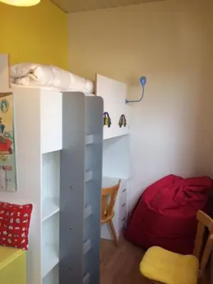 Ein Bett oder Betten in einem Zimmer der Unterkunft Ferienwohnung Schützen-Sterne