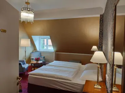 Ein Bett oder Betten in einem Zimmer der Unterkunft Hotel Erbprinzenpalais