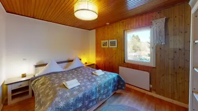 Ein Bett oder Betten in einem Zimmer der Unterkunft Ferienhaus Siesta Hahnenklee mit großem Grundstück
