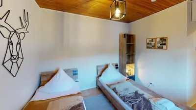 Ein Bett oder Betten in einem Zimmer der Unterkunft Ferienhaus Siesta Hahnenklee mit großem Grundstück