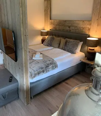 Ein Bett oder Betten in einem Zimmer der Unterkunft ferienapartment hahnenklee Apart.2