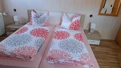 Ein Bett oder Betten in einem Zimmer der Unterkunft Ferienwohnung Friedrichsruh
