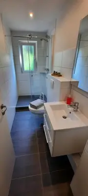 Ein Badezimmer in der Unterkunft Appartement An der Radau