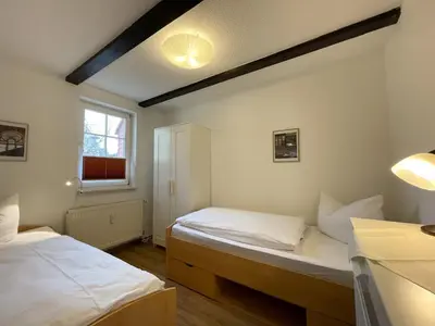 Ein Bett oder Betten in einem Zimmer der Unterkunft Apartment No12 mit zwei Schlafzimmern und Wohnküche