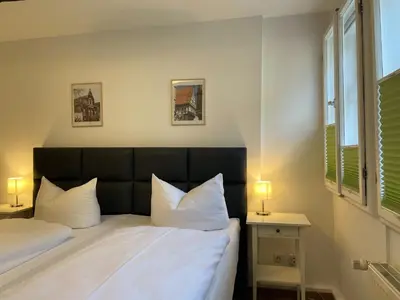 Ein Bett oder Betten in einem Zimmer der Unterkunft Apartment No12 mit zwei Schlafzimmern und Wohnküche