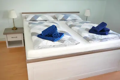 Ein Bett oder Betten in einem Zimmer der Unterkunft Ferienwohnung Werenberg Goslar