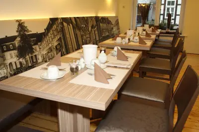 Ein Restaurant oder anderes Speiselokal in der Unterkunft Hotel Die Tanne