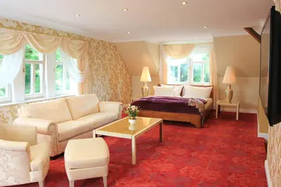 Ein Sitzbereich in der Unterkunft Boutiquehotel Schloßpalais