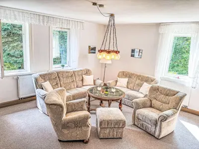 Ein Sitzbereich in der Unterkunft Apartment Altes Forsthaus Sösetal by Interhome
