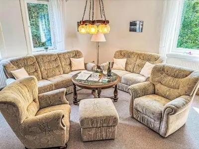 Ein Sitzbereich in der Unterkunft Apartment Altes Forsthaus Sösetal by Interhome