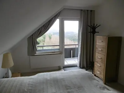 Ein Bett oder Betten in einem Zimmer der Unterkunft Ferienwohnung Panoramablick
