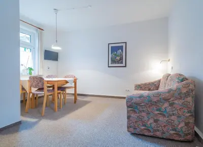 Ein Sitzbereich in der Unterkunft Gärtnerhaus Am Wald