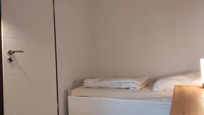 Ein Bett oder Betten in einem Zimmer der Unterkunft Harz Stube