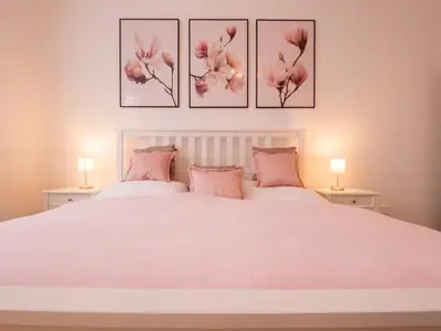 Ein Bett oder Betten in einem Zimmer der Unterkunft EUPHORAS - Modern eingerichtete Ferienwohnung mit 3 Schlafzimmern im Harz