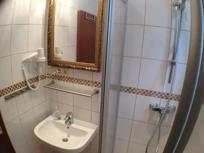 Ein Badezimmer in der Unterkunft Pension Winkel
