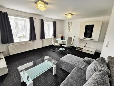 Ein Sitzbereich in der Unterkunft Apartments Villa-Ratskopf Wernigerode