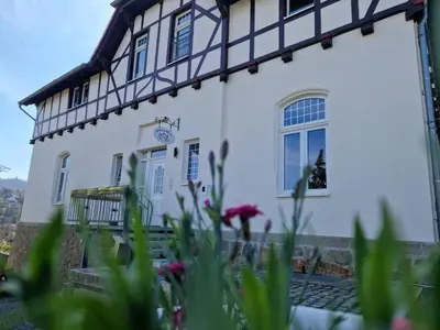 Ein Garten an der Unterkunft Apartments Villa-Ratskopf Wernigerode