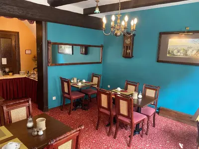 Ein Restaurant oder anderes Speiselokal in der Unterkunft Hotel garni Am Dippeplatz